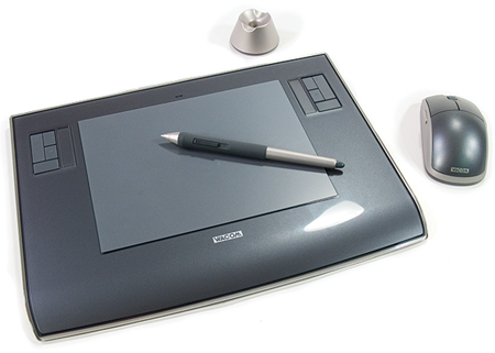 A photo of a Wacom Tablet, pen tool and mouse